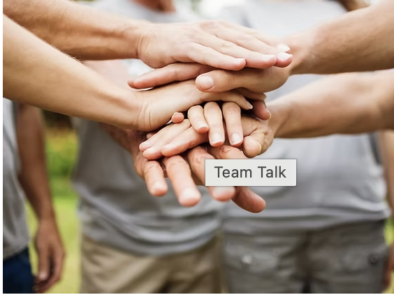 Community members joining hands